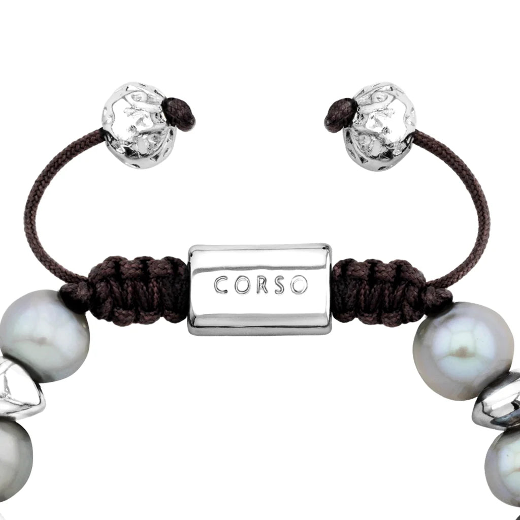 Pulsera ajustable con hilo de seda café, con perlas negras tahitianas 8-10mm con detalles en baño de rodio - Joyería y bisutería fina