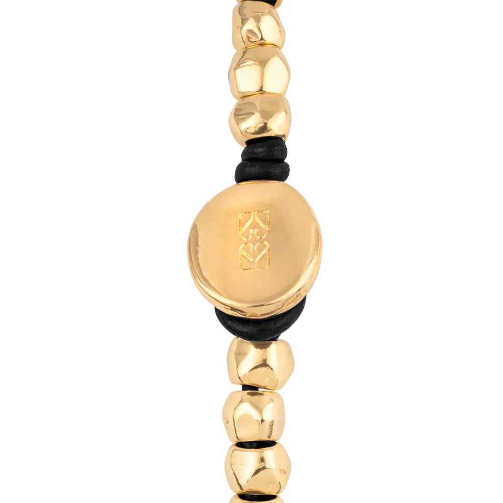 Pulsera de Piel española con cuentas geométricas, elemento tubular y broche de botón en baño de oro 22K- Joyería y bisutería fina