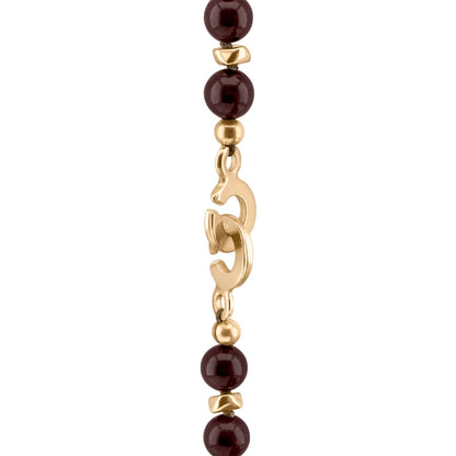 Collar de 53cm, con piedras de 8mm, con mini semillas y dije de colmillo dorados - Joyería y bisutería fina