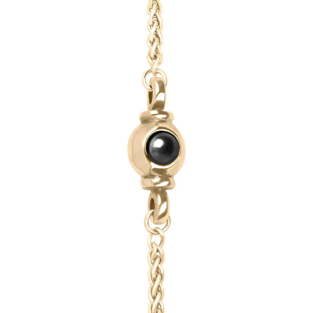 Collar de 42cm, con piedras de 6mm, con dije de cruz y cadena torsal en terminado de acero anticado en baño de oro de 22K - Joyería y bisutería fina