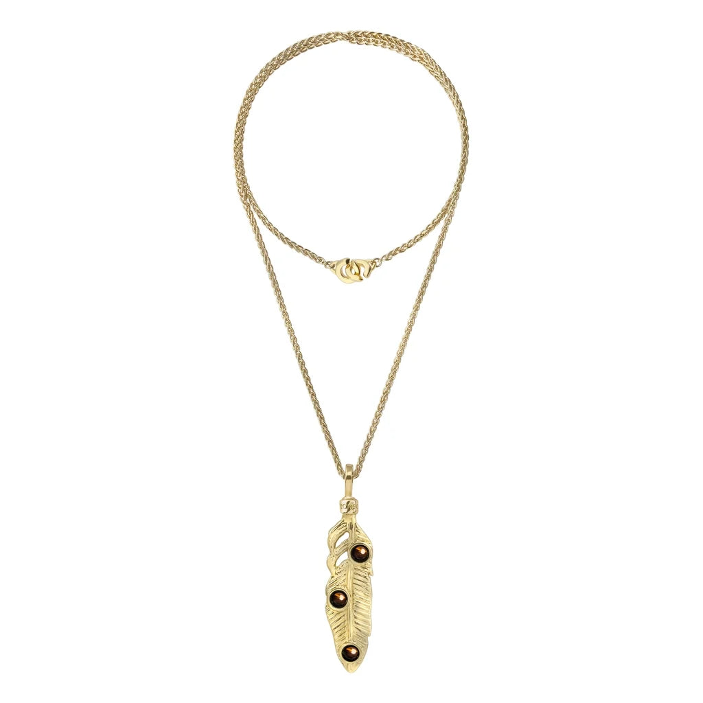 Collar de 36cm con piedras de 6mm, mini donas y dije de pluma en terminado de acero anticado en baño de oro de 22K - Joyería y bisutería fina