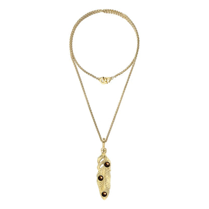 Collar de 36cm con piedras de 6mm, mini donas y dije de pluma en terminado de acero anticado en baño de oro de 22K - Joyería y bisutería fina