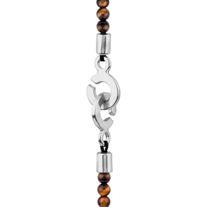 Collar de 39cm con piedras de 4mm, mini donas en acero, dije de ojo terminado en acero anticado - Joyería y bisutería fina