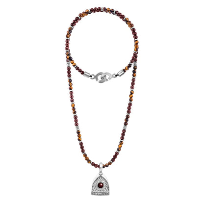 Collar de 39cm con piedras de 4mm, mini donas en acero, dije de ojo terminado en acero anticado - Joyería y bisutería fina