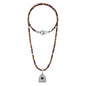 Collar de 39cm con piedras de 4mm, mini donas en acero, dije de ojo terminado en acero anticado - Joyería y bisutería fina