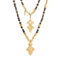 Collar de 112cm en baño de oro 22K, con una composición de piedras de 6mm y cuentas doradas, complementando un dije de cruz africana barroca - Joyería y bisutería fina