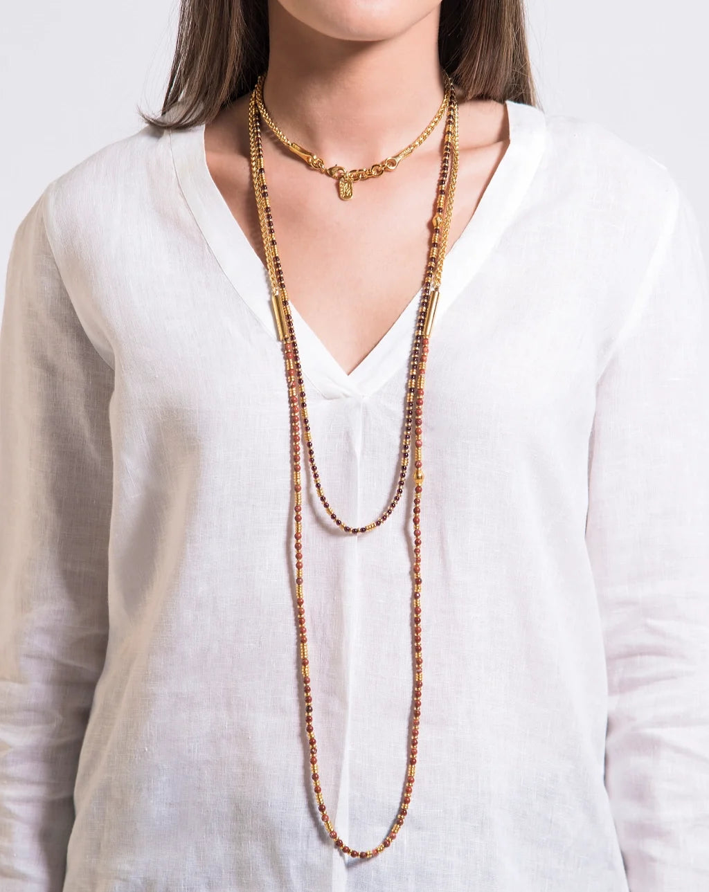 Collar de 54cm, con piedras de 4mm, cadena torzal, arroces y donas en baño de oro 22K - Joyería y bisutería fina