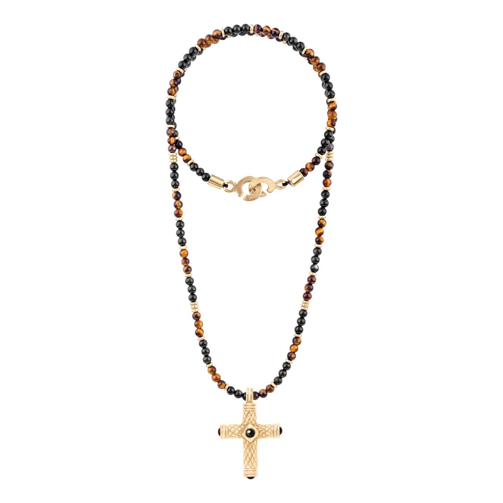 Collar de 39cm, con piedras de 4mm, con dije de cruz y mini donas en terminado de acero anticado bañado en oro de 22K - Joyería y bisutería fina