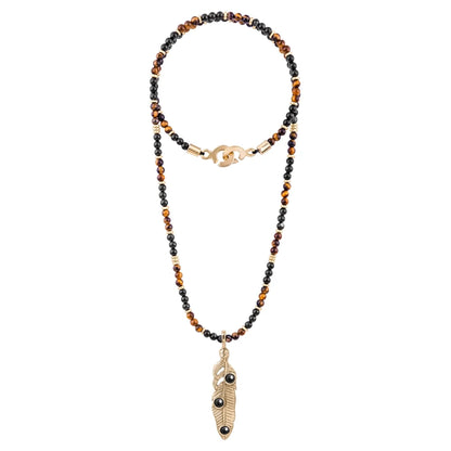 Collar de 39cm con piedras de 4mm, mini donas y dije de pluma en terminado de acero anticado bañado en oro 22k- Joyería y bisutería fina