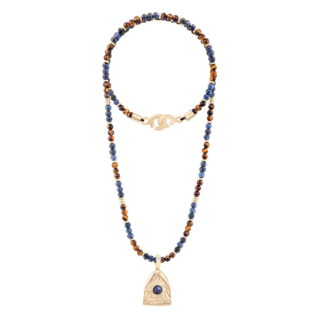 Collar de 39cm con piedras de 4mm, mini donas en acero, dije de ojo terminado en acero anticado bañado en oro 22K - Joyería y bisutería fina