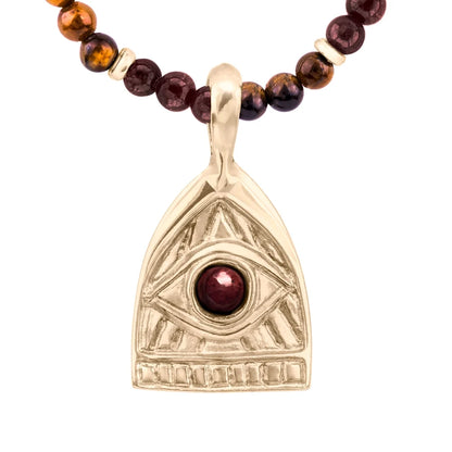 Collar de 39cm con piedras de 4mm, mini donas en acero, dije de ojo terminado en acero anticado bañado en oro 22K - Joyería y bisutería fina