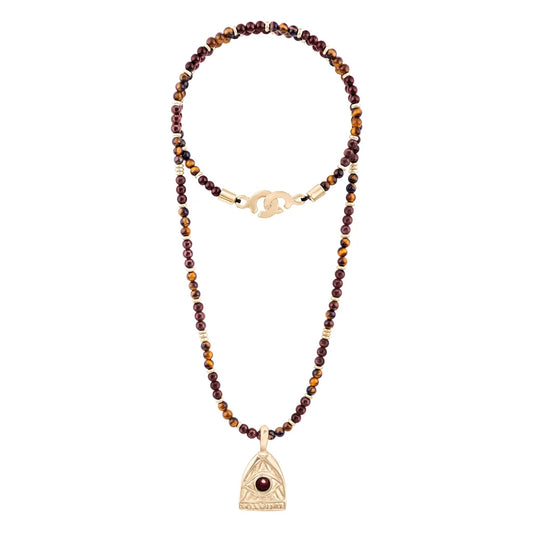 Collar de 39cm con piedras de 4mm, mini donas en acero, dije de ojo terminado en acero anticado bañado en oro 22K - Joyería y bisutería fina