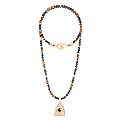 Collar de 39cm con piedras de 4mm, mini donas en acero, dije de ojo terminado en acero anticado bañado en oro 22K - Joyería y bisutería fina