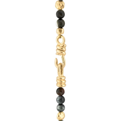 Collar de 57cm con piedra ojo de halcón de 8mm, con lunetas y dije de pluma doradas - Joyería y bisutería fina