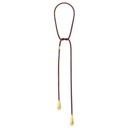 Corbatín con gotas bañadas en Oro 22K, Piel de borrego natural - Joyería y bisutería fina