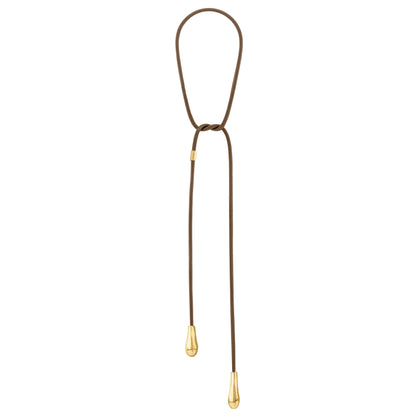 Corbatín con gotas bañadas en Oro 22K, Piel de borrego natural - Joyería y bisutería fina