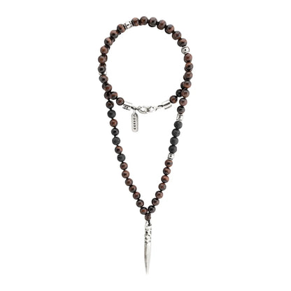 Collar para hombre con piedras volcánicas y ojo de tigre rojo. Dije en forma de baqueta para cuenco tibetano en terminado acero pulido - Joyería y bisutería fina