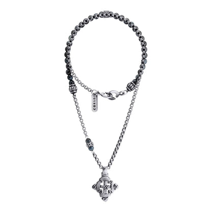 Collar de 35.5cm con piedras de 6mm,cadena de acero anticado y dije de cruz africana barroca en terminado de acero pulido - Joyería y bisutería fina