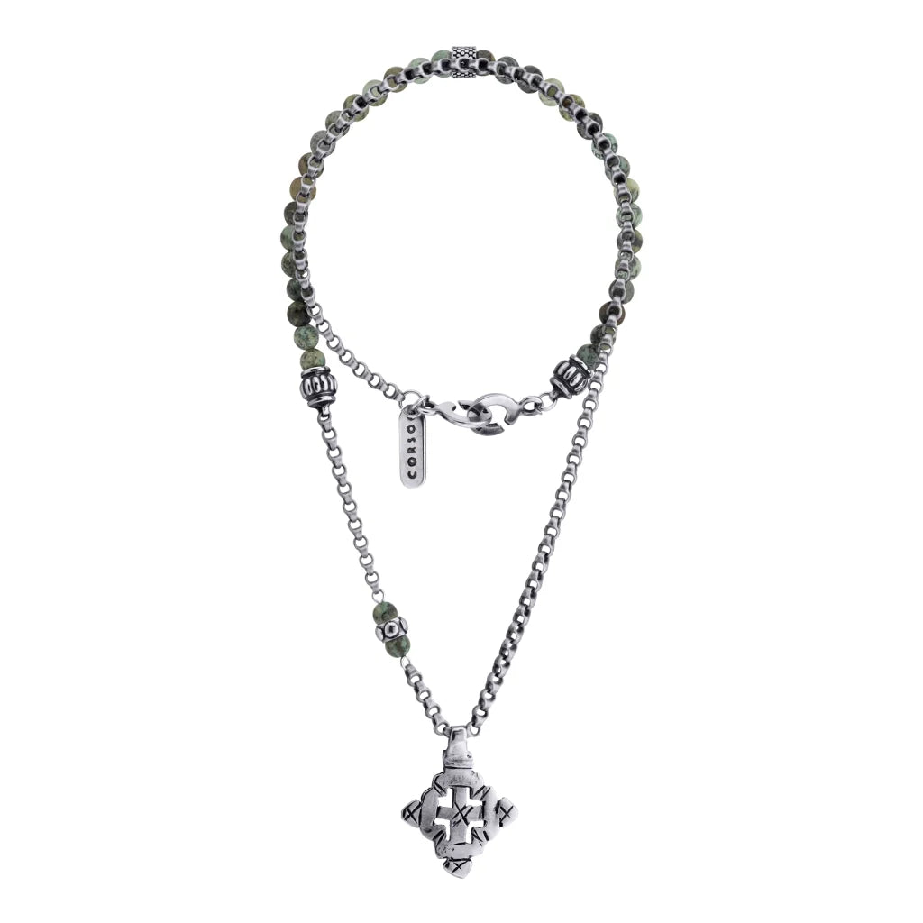 Collar de 35.5cm con piedras de 6mm,cadena de acero anticado y dije de cruz africana barroca en terminado de acero pulido - Joyería y bisutería fina