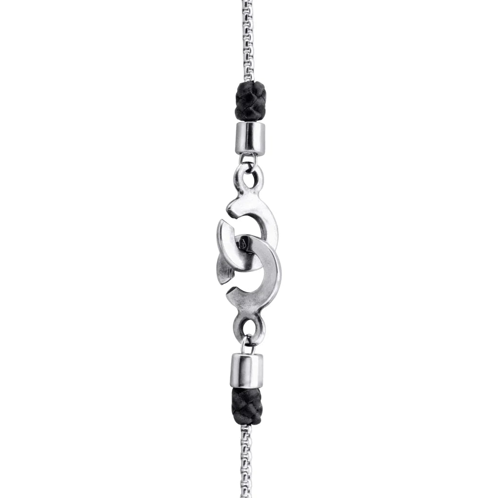 Collar de 35cm con detalles en piel, cadena de acero inoxidable y dije de sol del taro en terminado de acero pulido - Joyería y bisutería fina