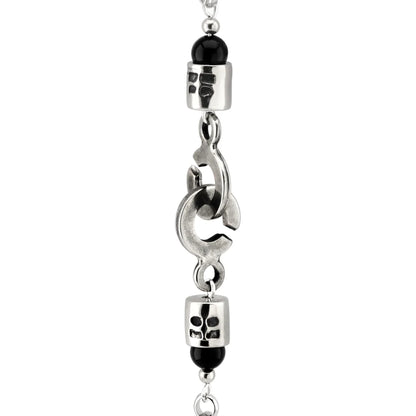 Collar de 39cm con piedras Ónix negro o coral rojo de 6mm, con cadena y dije de pluma y cruz en acero anticado - Joyería y bisutería fina