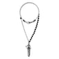 Collar de 39cm con piedras Ónix negro o coral rojo de 6mm, con cadena y dije de pluma y cruz en acero anticado - Joyería y bisutería fina
