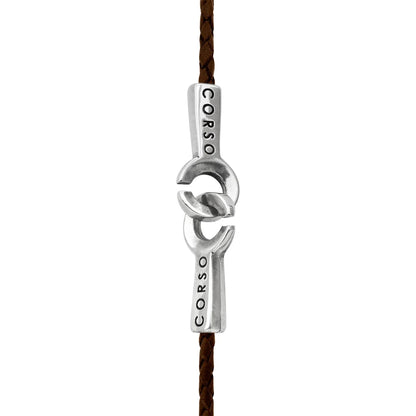 Collar de 31cm de piel natural de borrego en trenza redonda de 4 hilos, con dije de tejido corso en terminado de acero pulido - Joyería y bisutería fina