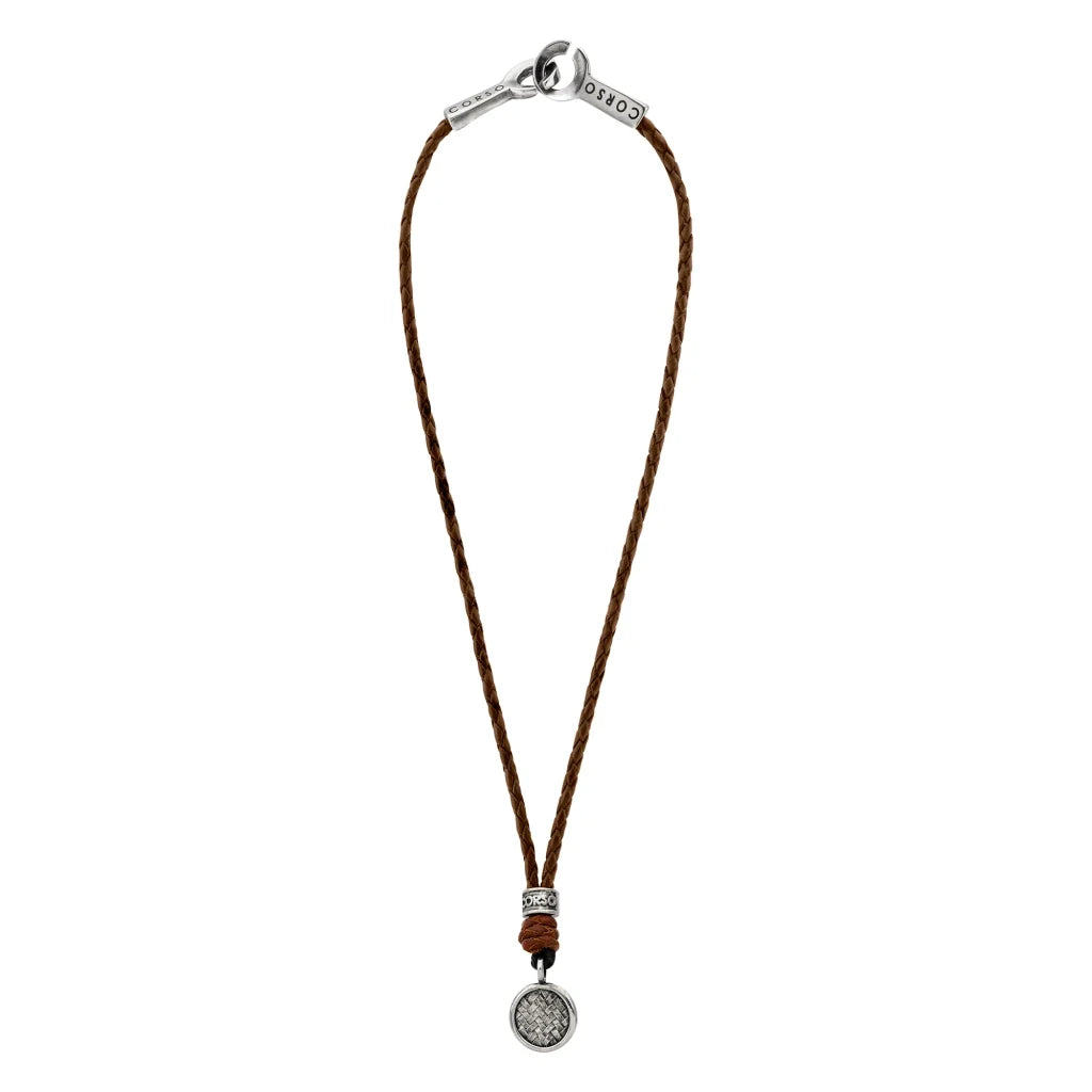 Collar de 31cm de piel natural de borrego en trenza redonda de 4 hilos, con dije de tejido corso en terminado de acero pulido - Joyería y bisutería fina