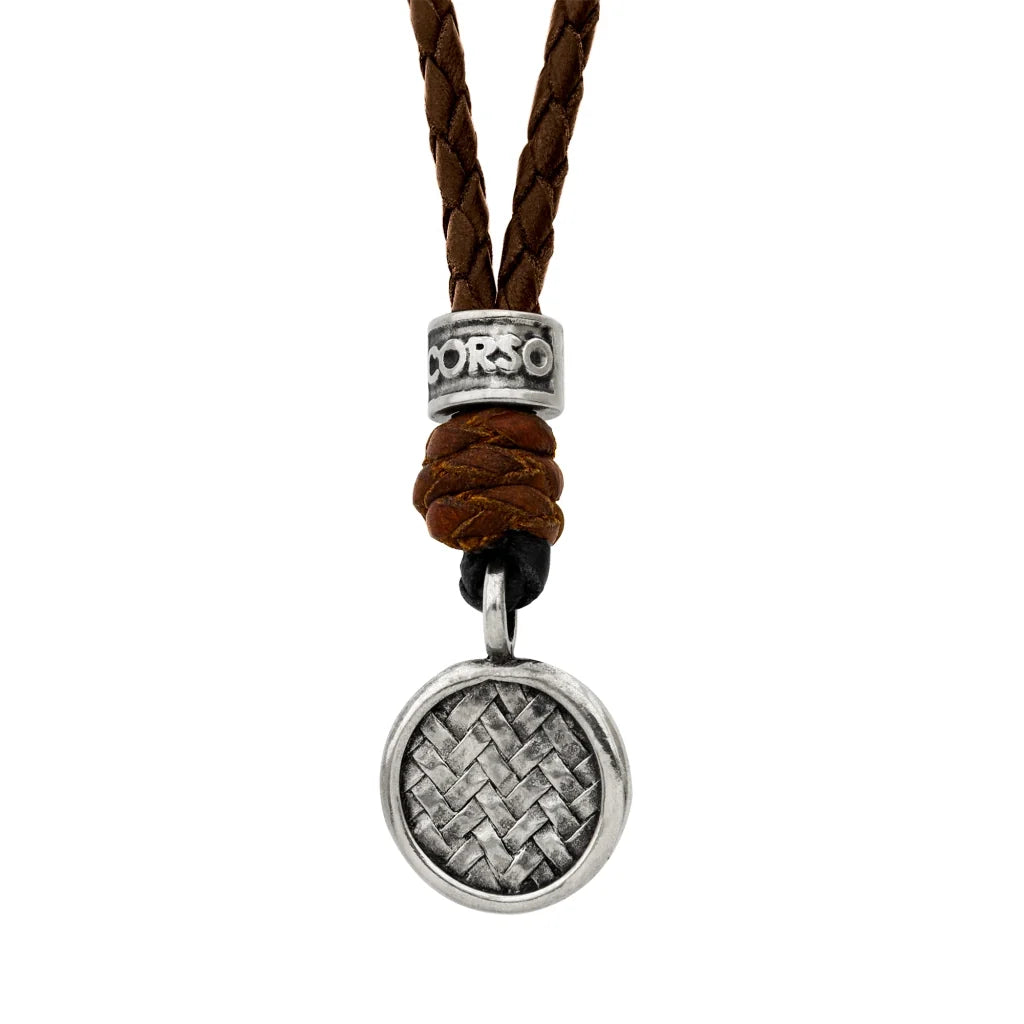 Collar de 31cm de piel natural de borrego en trenza redonda de 4 hilos, con dije de tejido corso en terminado de acero pulido - Joyería y bisutería fina
