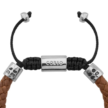 Pulsera de piel natural de borrego trenzada, con detalles en terminado de acero, con placa insignia en baño de rodio - Joyería y bisutería fina