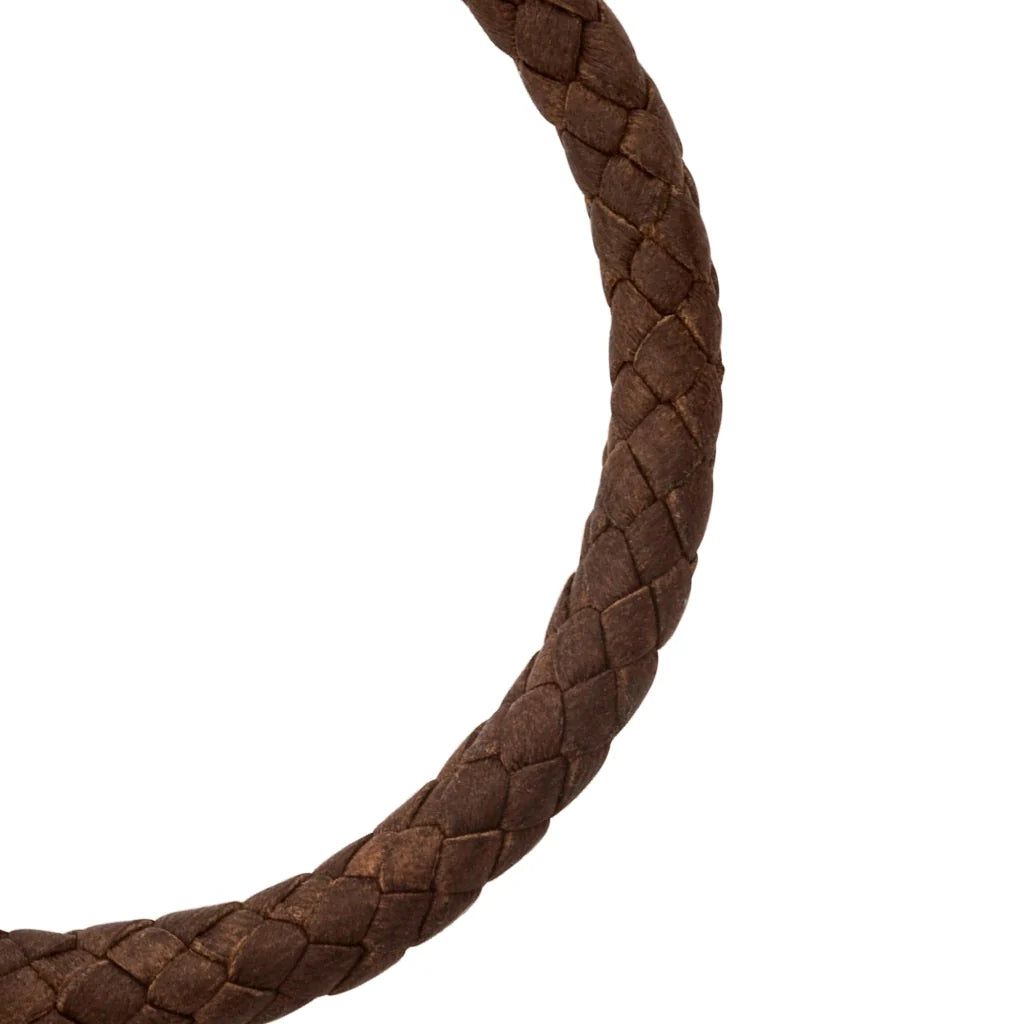Pulsera de piel natural de borrego trenzada, con detalles en terminado de acero, con placa insignia en baño de rodio - Joyería y bisutería fina