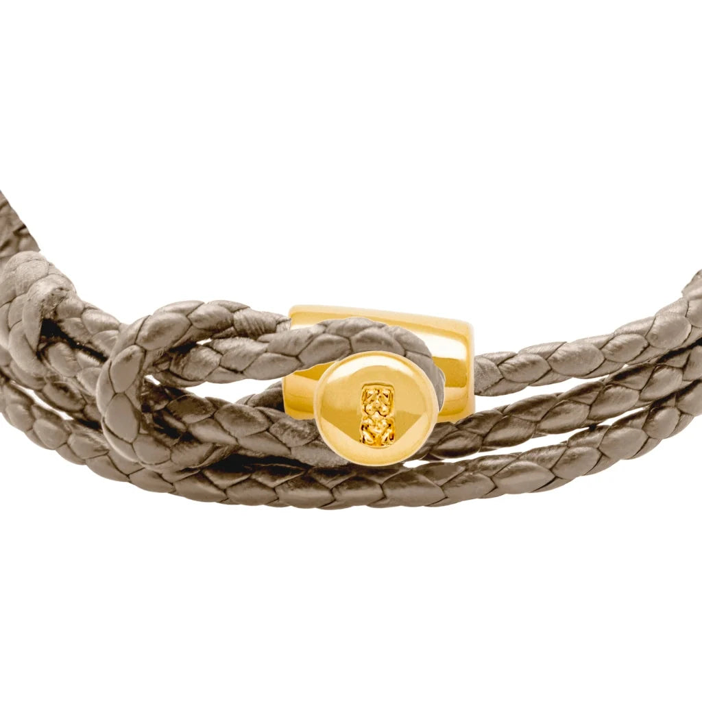 Pulsera de piel natural de borrego con trenza de cuatro hilos, con broche en baño de oro de 22K - Joyería y bisutería fina
