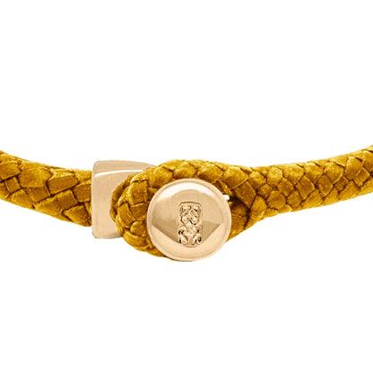 Pulsera de piel natural de borrego en trenza de ocho tiras, con broche en baño de oro 22K - Joyería y bisutería fina