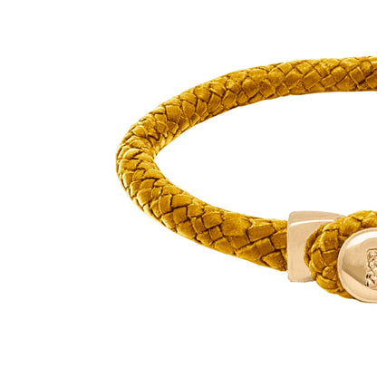 Pulsera de piel natural de borrego en trenza de ocho tiras, con broche en baño de oro 22K - Joyería y bisutería fina
