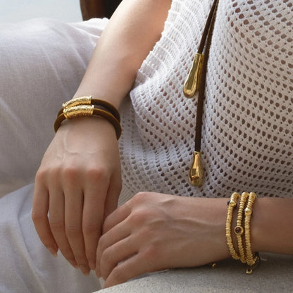 Pulsera Baño de Oro 22K, piel natural nappa, diseño hojas de laurel