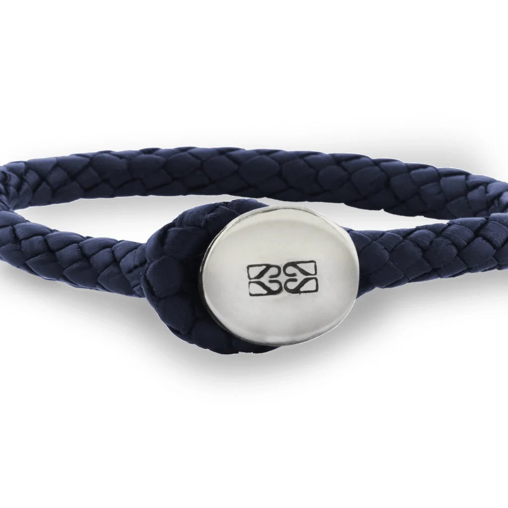 Pulsera para hombre, elaborada con piel natural de borrego trenzada y broche de botón en terminado acero - Joyería y bisutería fina