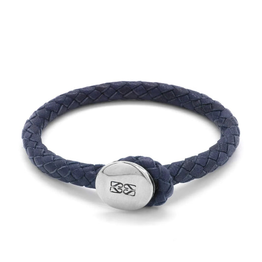Pulsera para hombre, elaborada con piel natural de borrego trenzada y broche de botón en terminado acero - Joyería y bisutería fina