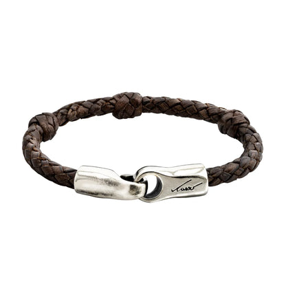 Pulsera con trenza en piel natural de borrego. Incluye nudos de piel y un broche de gancho en terminado acero inoxidable - Joyería y bisutería fina