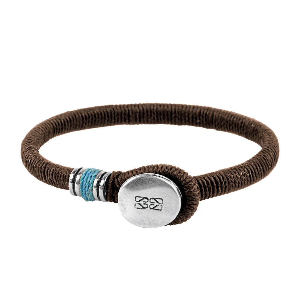 Pulsera unisex con hilo encerado, complementada con un cilindro y un broche de botón en terminado acero. Disponible en 6 colores de hilo. - Joyería y bisutería fina