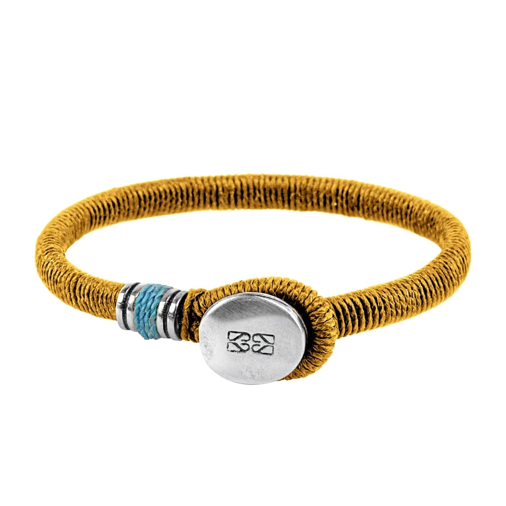 Pulsera unisex con hilo encerado, complementada con un cilindro y un broche de botón en terminado acero. Disponible en 6 colores de hilo. - Joyería y bisutería fina