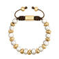 Pulsera ajustable con hilo de seda café, con perlas negras japonesas 8-10mm con detalles en baño de oro de 22K - Joyería y bisutería fina