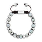 Pulsera ajustable con hilo de seda café, con perlas negras tahitianas 8-10mm con detalles en baño de rodio - Joyería y bisutería fina