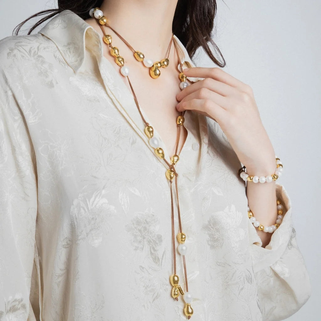 Collar de piel de canguro, con 25 perlas en baño de oro de 22K, con 10 perlas australianas - Joyería y bisutería fina