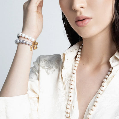 Pulsera con perlas japonesas y tahitianas, trenzada con detalles en baño de Oro 22K - Joyería y bisutería fina