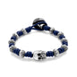 Pulsera de nudos de piel natural española, con broche de botón, mantras y calavera en terminado de acero - Joyería y bisutería fina
