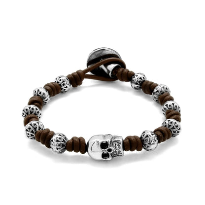Pulsera de nudos de piel natural española, con broche de botón, mantras y calavera en terminado de acero - Joyería y bisutería fina
