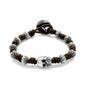 Pulsera de nudos de piel natural española, con broche de botón, mantras y calavera en terminado de acero - Joyería y bisutería fina