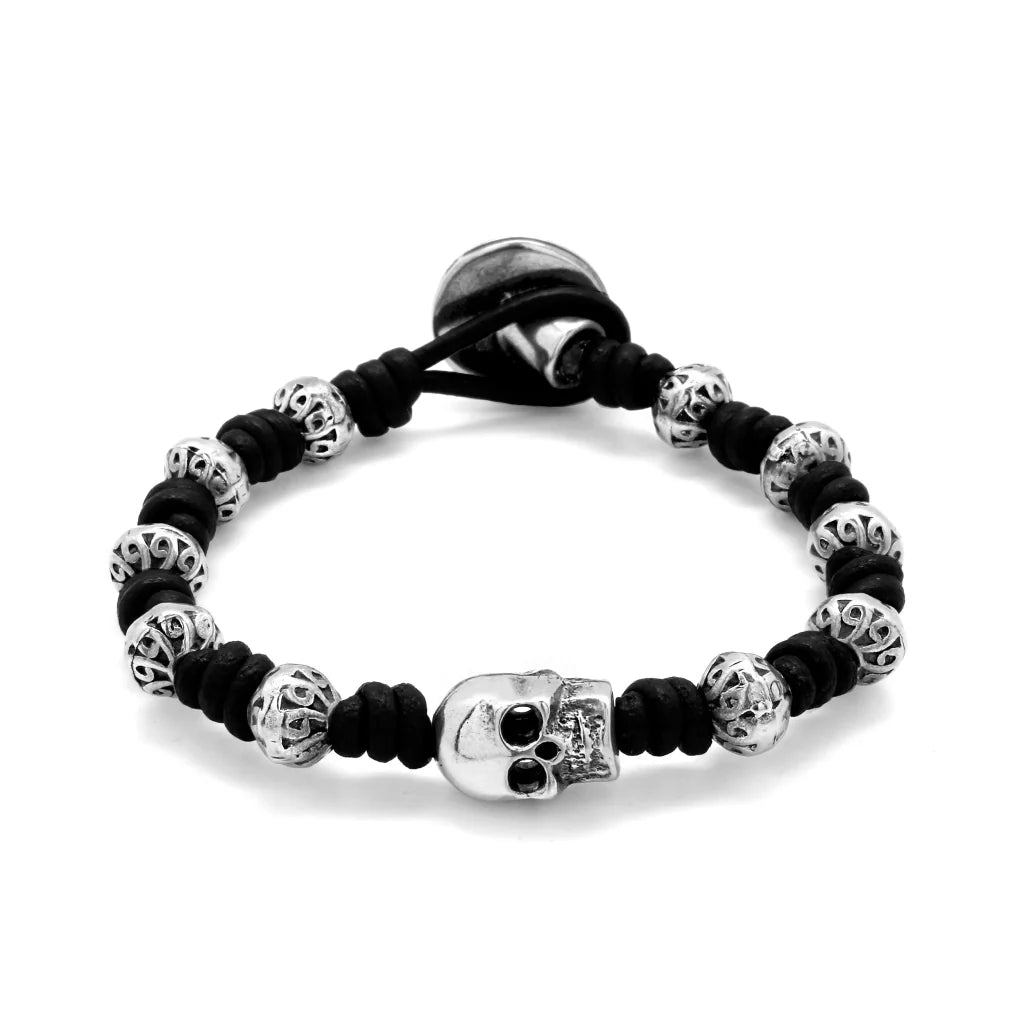 Pulsera de nudos de piel natural española, con broche de botón, mantras y calavera en terminado de acero - Joyería y bisutería fina