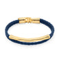 Pulsera de piel natural de borrego trenzada, con broche y detalle tubular en baño de oro de 22K - Joyería y bisutería fina