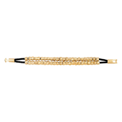 Pulsera de piel natural de borrego trenzada, con broche y cuentas geométricas en baño de oro de 22K - Joyería y bisutería fina